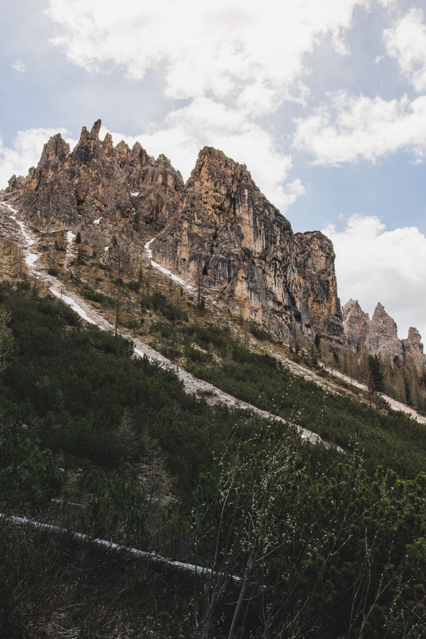 Dolomites jagged mountain pass under clear morning light